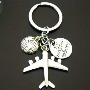Silver toned travel key chain / bag charm